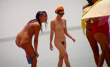femaleS HAVING FUN AT THE BEACH